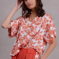 Faro broderie blouse in shiny orange